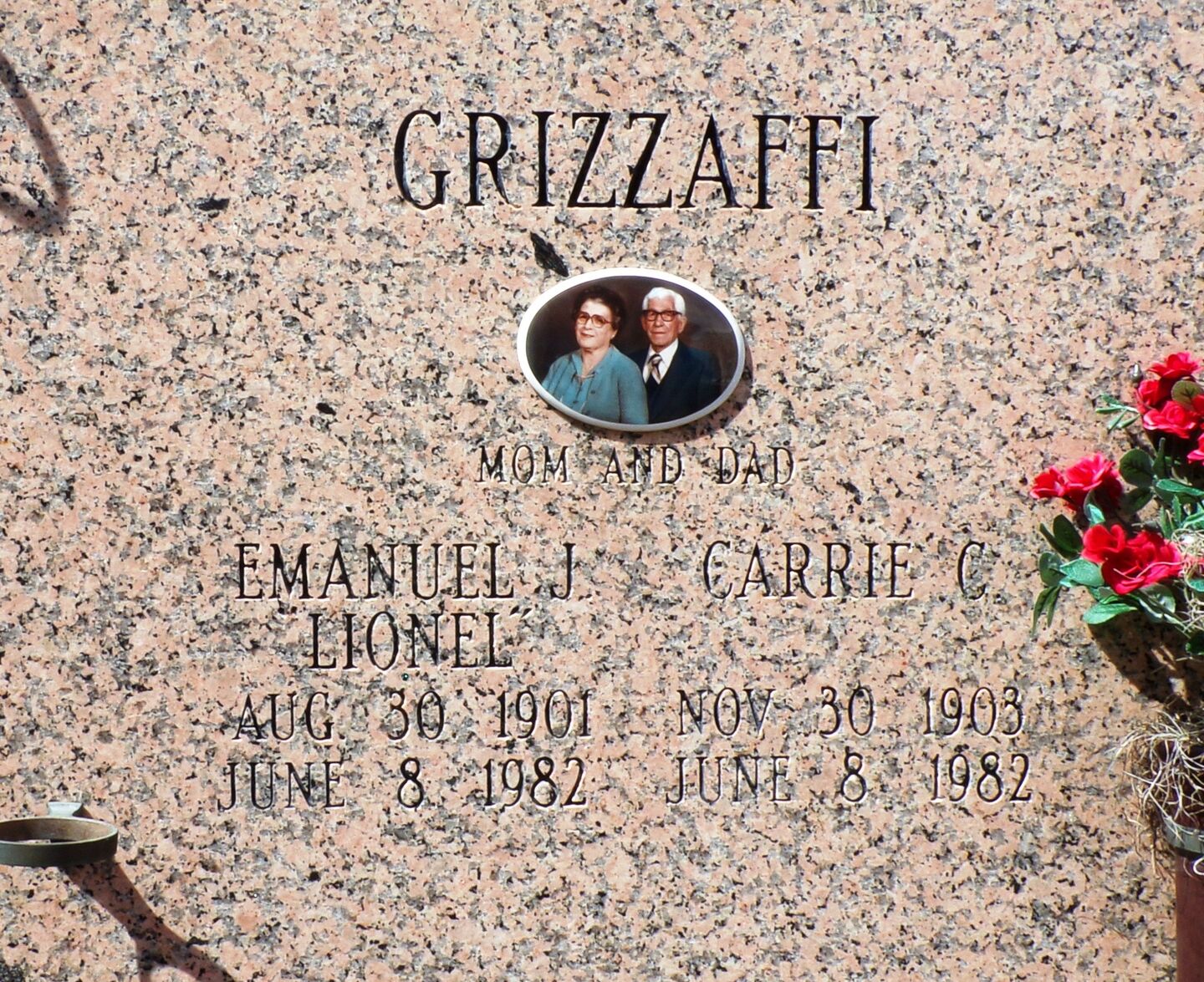 Grave Plot of E.J. Lionel and Carrie C. Grizzaffi.