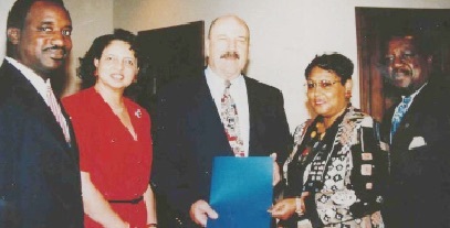 Courtesy photograph of State Representative Willie Hunter. Wilkerson and State Representative Pinkie Wilkerson with Louisiana Governor Murphy "Mike" Foster.