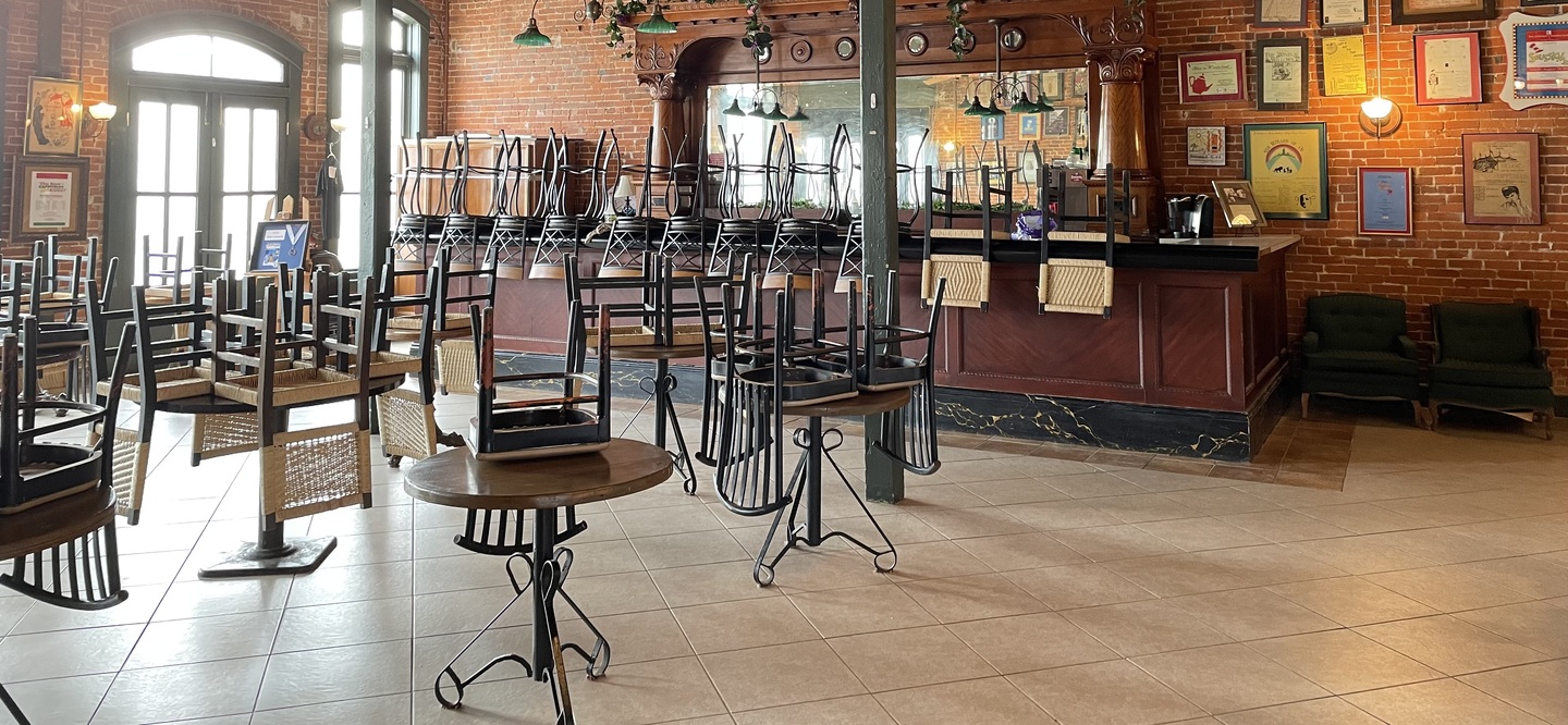 Inside seating area with view of the bar set up.