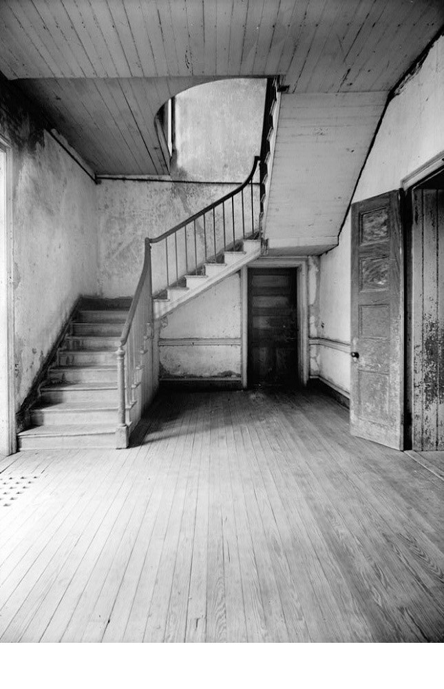 Hall and stairs as seen from the front door of the Chretien Point Plantation mansion.