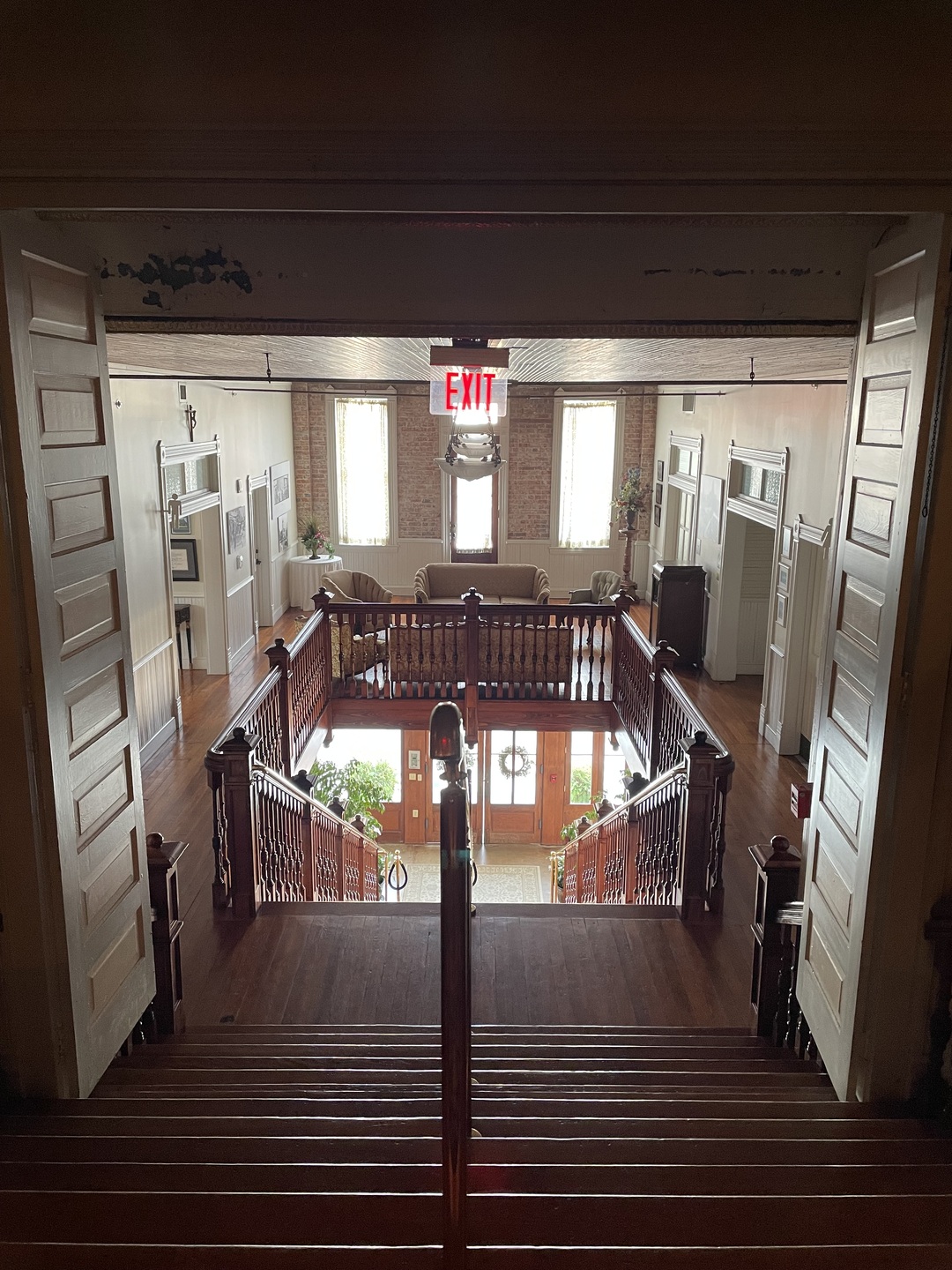 Stairwell from the first floor (wedding reception area) to the second floor (attendee area) and ending with the third floor (the theater).