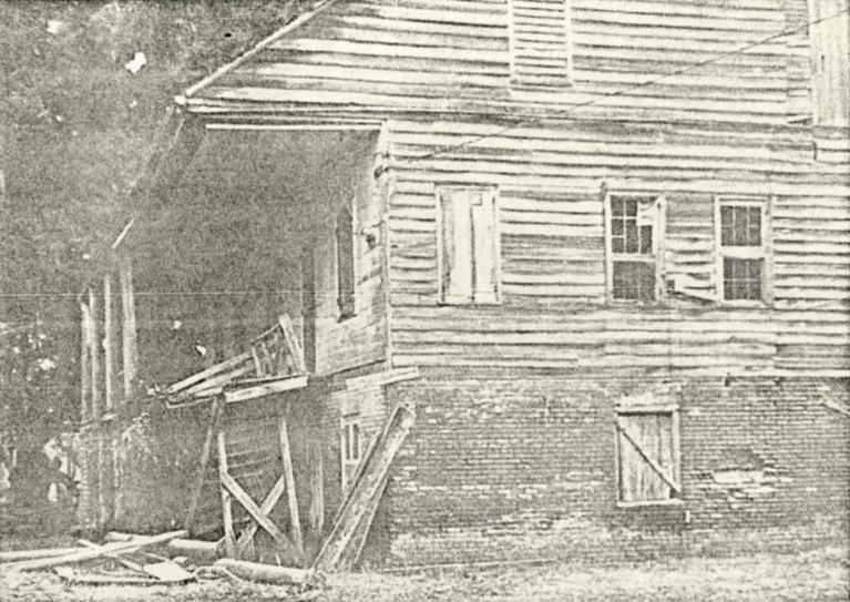 The side view of the front staircase of Darby Plantation before it was destroyed by fire.