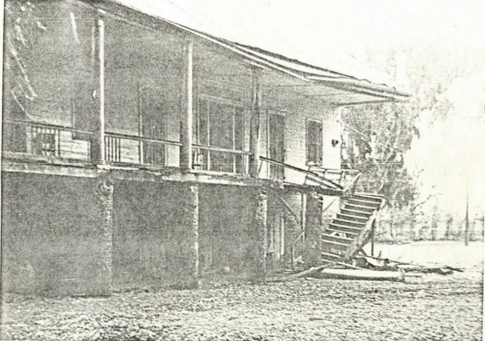View of the front porch with the staircase of Darby Plantation before it was destroyed by fire.