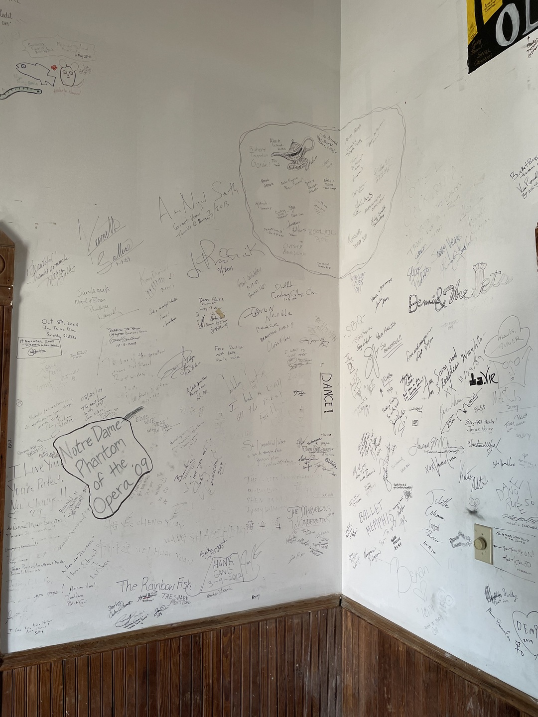 Modern markers by previous children's plays with actors' names and sayings