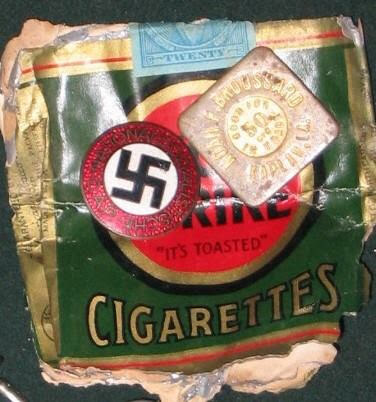 A swasika on a German POW's pack of cigarettes.